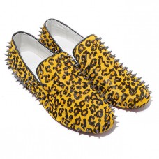 Christian Louboutin Rolling Spikes loafers geel